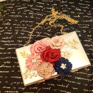 Silver purse with flowers